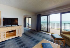 A living room with a tv and a couch