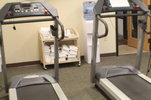 Two treadmills in a gym room.