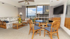 Ocean view living room with rattan furniture.