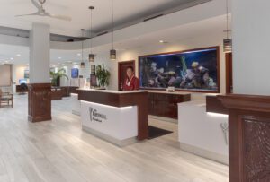 Hotel reception with a fish tank.