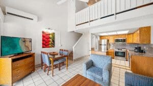 Modern open-plan living room and kitchen.