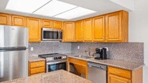 Oak cabinets and stainless steel appliances