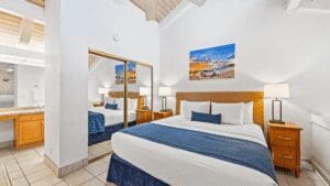 Modern hotel room with double bed.